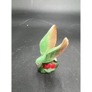 porcelain hummingbird figurine On Barry Base